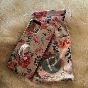 Loopy 11 pro righty case with loop and bag. Gardenia with teal bumper.